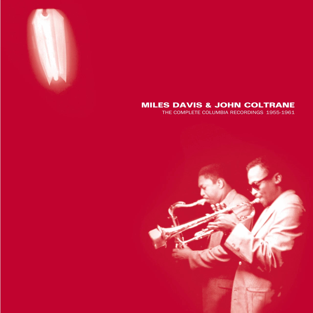 Image of Album cover for 'Miles Davis & John Coltrane: The Complete Columbia Recordings 1955-1961' featuring a deep red background, white text, and a faded monochrome photo of the two jazz musicians playing brass instruments.